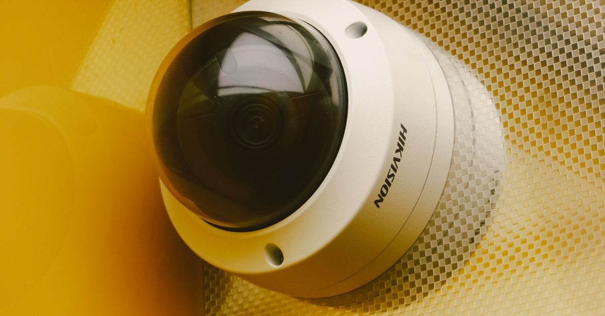 From below of modern camera for recording audio and video in building for security and protection