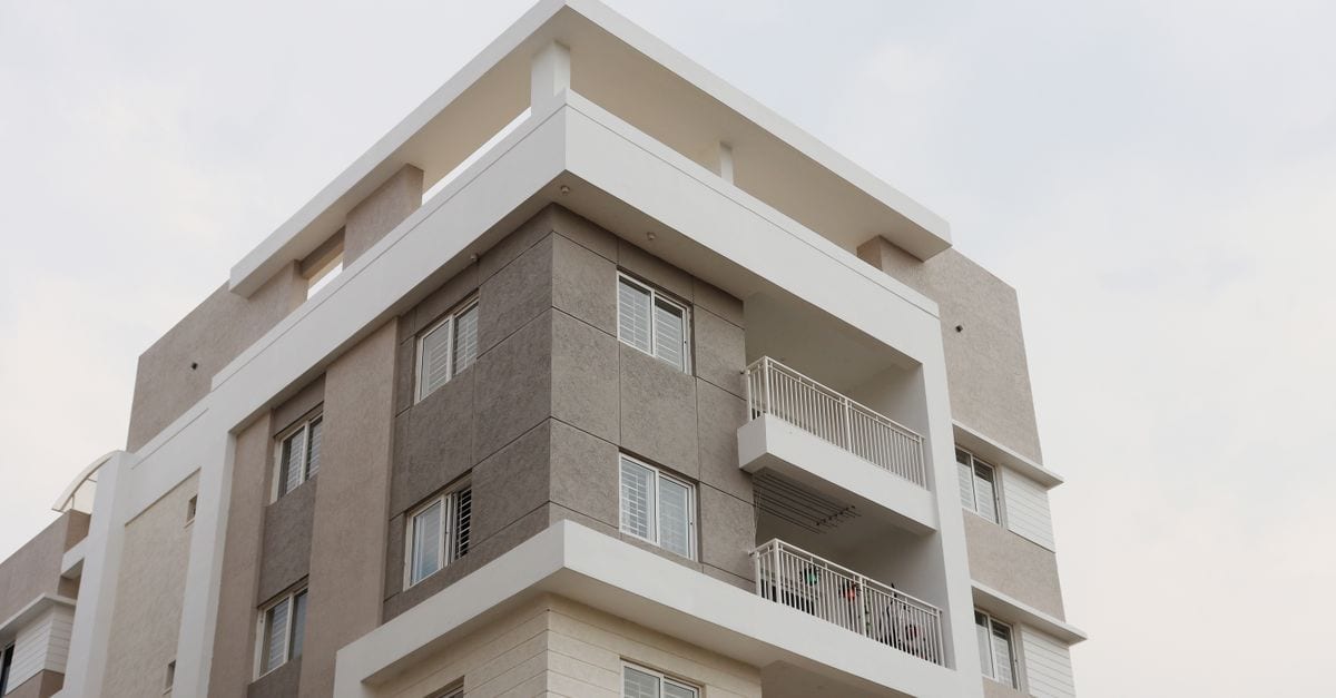 Contemporary apartment building with balconies captured in Hyderabad, India.